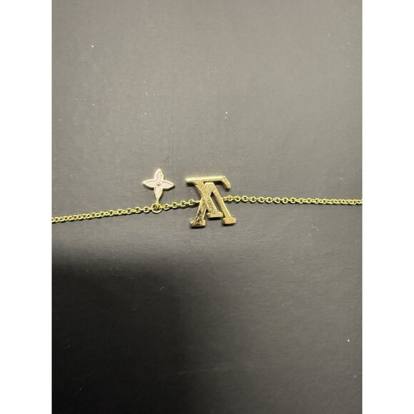Louis Vuitton Gold-Tone Bracelet With LV Logo & Flower Charm Adjustable Chain In - Picture 2 of 8